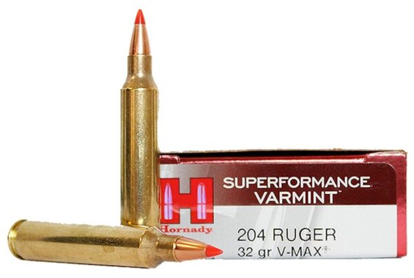 Two .204 caliber rifle cartridges with a Hornady box labeled "SUPERFORMANCE VARMINT".