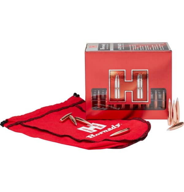 HORNADY 7MM .284 166GR A-TIP MATCH - A red Hornady pouch with projectile bullets beside a red box featuring the Hornady logo and contained ammunition.