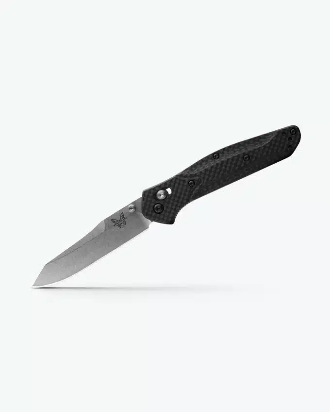 BENCHMADE OSBORNE CARBON FIBER - A sleek black folding knife with a textured handle and a sharp blade, featuring a butterfly logo on the blade's side.