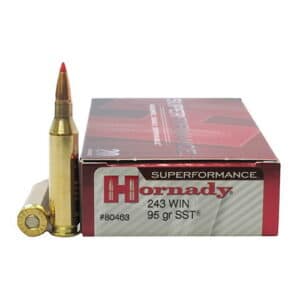 A box of Hornady Superformance .243 WIN ammunition with two cartridges displayed in front.