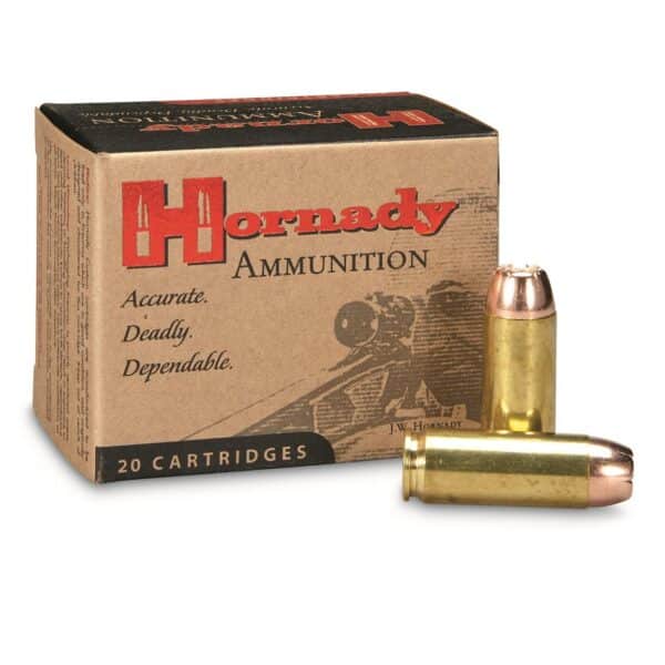 Box of Hornady 50 Action Express 300GR HP FTX ammunition with two cartridges in front.