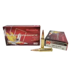 Box of Hornady Superformance ammunition with a single bullet in front.