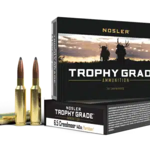 A box of Nosler Trophy Grade ammunition with 6.5 Creedmoor cartridges displayed in front.