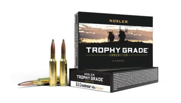 A box of Nosler Trophy Grade ammunition with 6.5 Creedmoor cartridges displayed in front.