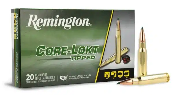 A box of Remington Core-Lokt Tipped rifle cartridges with one bullet displayed in front of it.