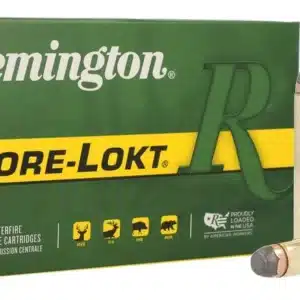 A box of Remington Core-Lokt rifle cartridges next to a single bullet.