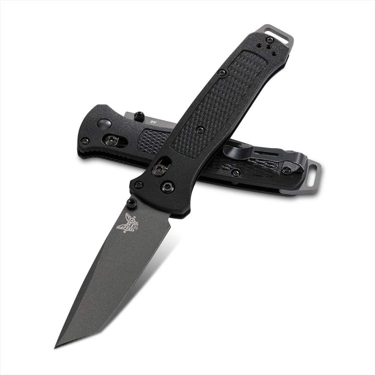 BENCHMADE BAILOUT - Two black Benchmade folding knives diagonally arranged, one with a partially visible blade and the other closed. The knives have textured handles, a pocket clip, and a visible butterfly logo on the open blade.