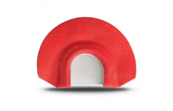 Red semi-circular object with a white interior on a white background.