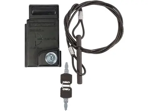 Locking cable system featuring a lock box, steel cable, and attachment hardware for securing objects.