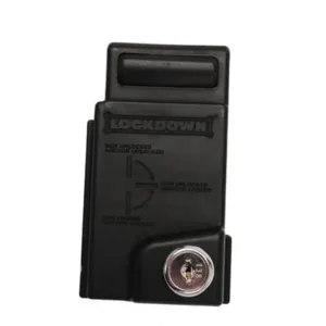 LOCKDOWN AR-15 MAG WELL - A black gun lock box labeled "LOCKDOWN," featuring a secure locking mechanism and a keyed lock for safety.