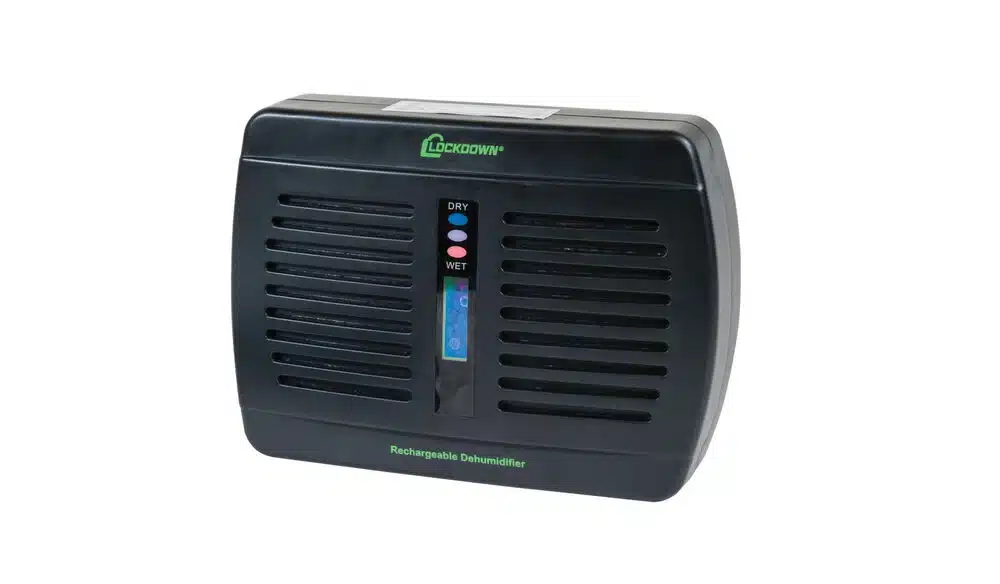 LOCKDOWN RECHARGEABLE DEHUMIDIFIER - A black rechargeable dehumidifier with indicator lights for dry and wet conditions, designed for moisture control in small spaces.