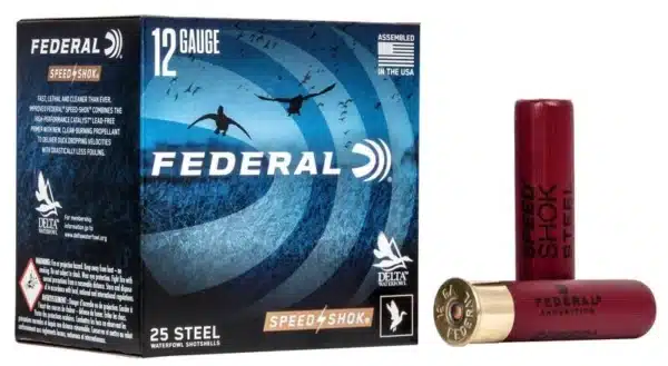 A box of Federal 12 Gauge steel waterfowl shotshells next to a single red shotgun shell.