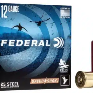 Box of Federal 12 Gauge shotgun shells with one shell standing upright next to the box.