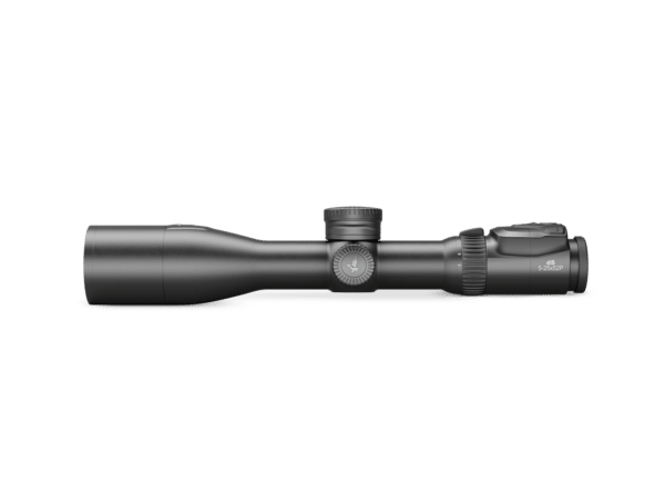 The image depicts a black rifle scope positioned horizontally. The left end (objective lens) is wider and tapers slightly to the main body. Several circular adjustment knobs are located along the cylindrical body, the largest one marked with a numerical scale. The magnification label "5-25x52P" appears in clear font on the side, indicating the scope’s capabilities. The finish is matte, reducing glare, with sharp edges accentuating its robust design.