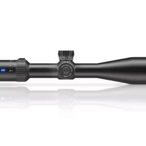 The rifle scope is shown horizontally against a white background, reflecting light below. It has a matte black finish, a zoom adjustment dial with textured grip on the left, a central elevation adjustment turret, and a tapered body leading to a large objective lens, emphasizing its streamlined design for enhanced accuracy.