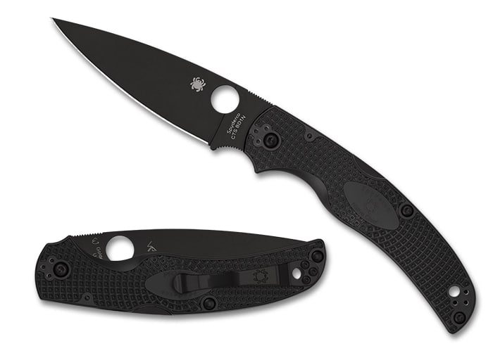 SPYDERCO NATIVE CHIEF BLACK LIGHTWEIGHT BLACK BLADE. A black folding knife with a textured handle and a slim, pointed blade, featuring a signature logo and pocket clip for easy carrying.