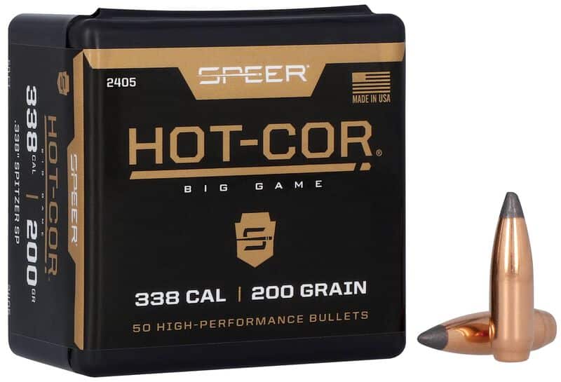 A box of Speer Hot-Cor ammunition, 338 caliber, 200 grain, with two copper-tipped bullets displayed beside it.