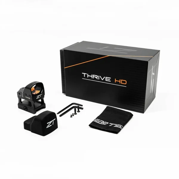 A Thrive HD sight package featuring a reflex sight, mounting tools, a cleaning cloth, and a protective cover, presented in a sleek box.