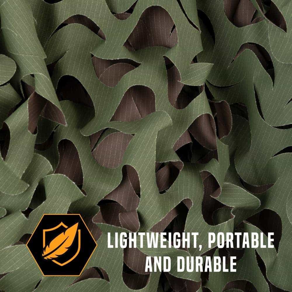 Close-up of textured camouflage fabric in green and brown, highlighting its lightweight, portable, and durable qualities.