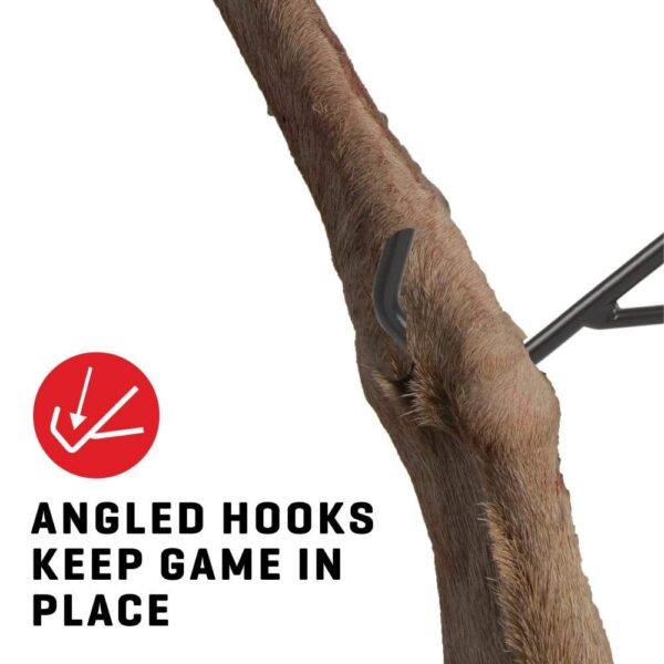 Close-up of angled hooks stabilizing game on a deer hide, emphasizing secure placement with bold text "Angled hooks keep game in place."