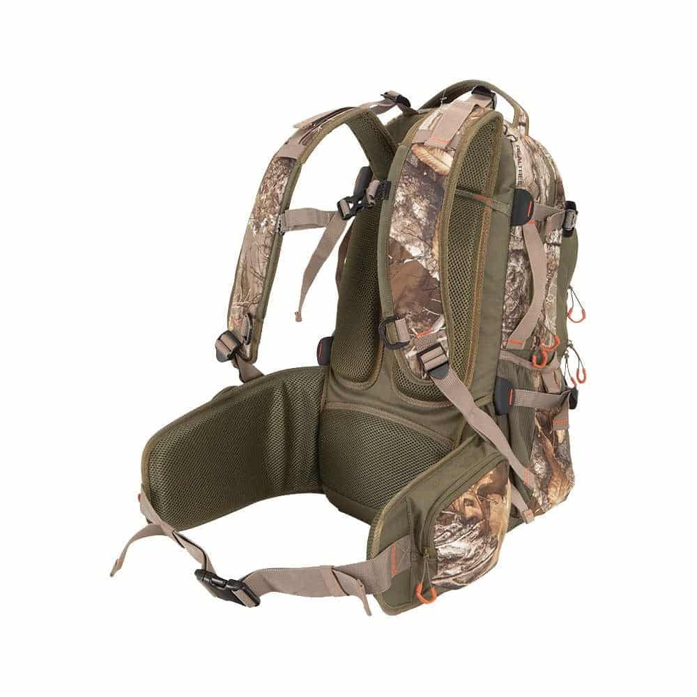 A camouflaged backpack with adjustable straps, featuring a supportive back design and multiple attachment points for gear.