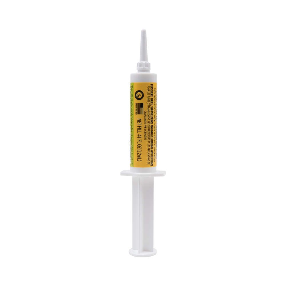 A white syringe with a yellow label, containing 4.1 fl oz of adhesive, designed for sealing and bonding materials.