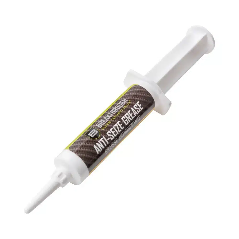 ANTI-SEIZE GREASE - 12CC SYRINGE - A tube of anti-seize grease with a white applicator tip, labeled "ANTI-SEIZE GREASE" against a carbon fiber background.