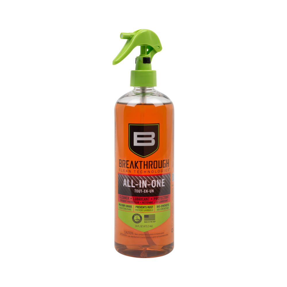 BATTLE BORN BIO-SYNTHETIC ALL IN-ONE (CLP) 16OZ - Clear spray bottle with green nozzle and orange/brown liquid, labeled "Breakthrough All-in-One" for cleaning, lubricating, and protecting surfaces.