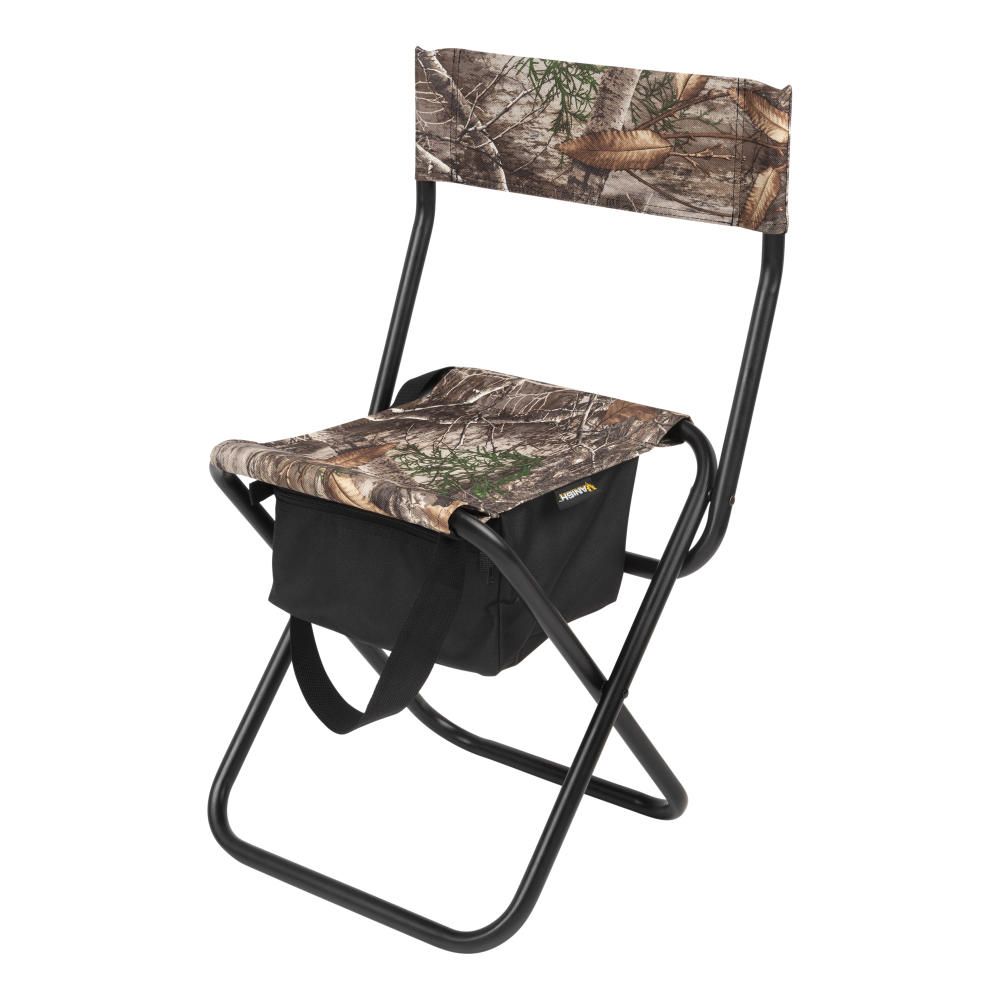 VANISH FOLDABLE SEAT WITH BACKREST - REALTREE EDGE - A foldable camping chair with a camouflage seat and backrest, and a black carrying pouch attached to its frame.