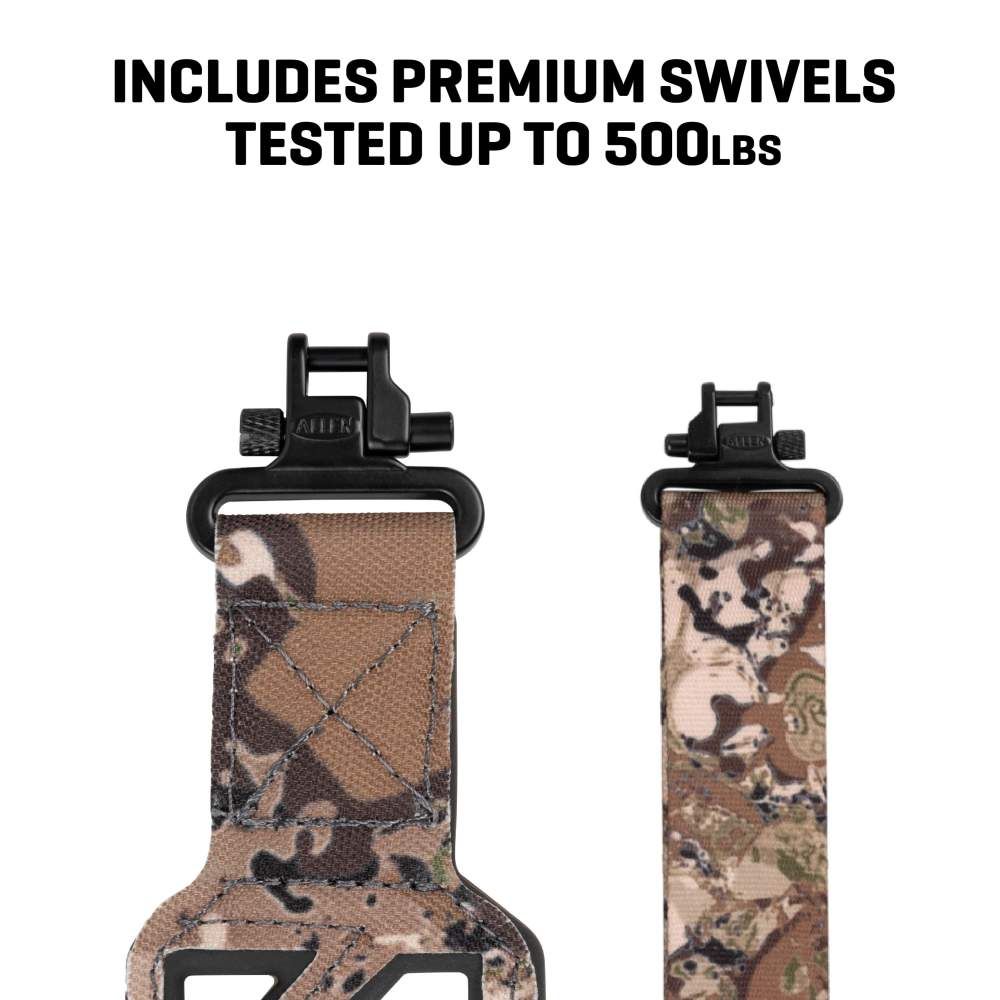 A close-up of a camo strap with premium swivels, tested to hold up to 500 lbs, highlighting durability and strength.