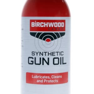 BIRCHWOOD CASEY SYNTHETIC GUN OIL AEROSOL - 10OZ - A can of Birchwood Casey Synthetic Gun Oil, labeled with instructions to lubricate, clean, and protect firearms, with hazard warnings.