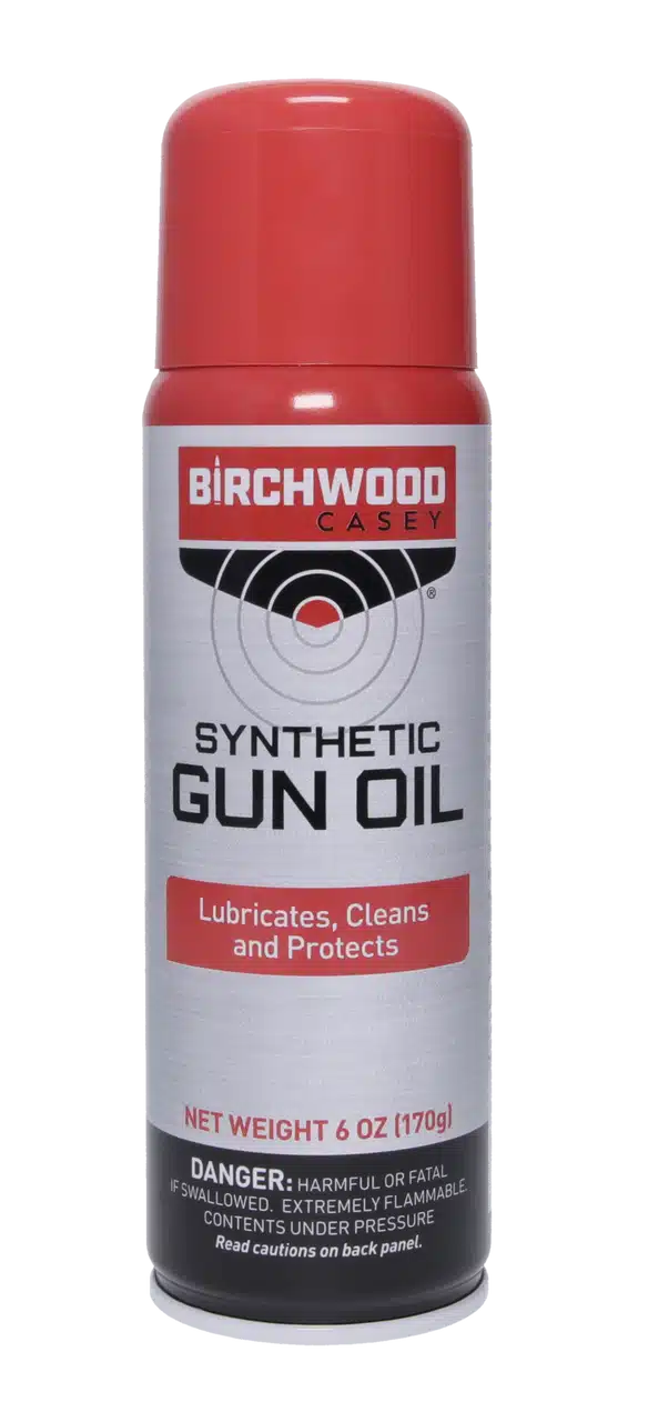 BIRCHWOOD CASEY SYNTHETIC GUN OIL AEROSOL - 6OZ - A can of Birchwood Casey Synthetic Gun Oil, labeled for lubrication, cleaning, and protection, with caution warnings on the bottom.