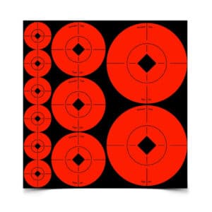 BIRCHWOOD CASEY TARGET SPOTS ASSORTED SIZE ORANGE TARGETS - A black target sheet featuring various red/orange circular targets with a diamond center, labeled 'Birchwood Casey' and 'Target Spot'.