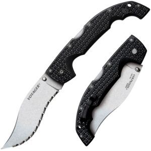COLD STEEL VOYAGER XL VAQUERO - SERRATED EDGE - Two Cold Steel Voyager folding knives, one open with a serrated blade, the other partially closed. Both knives feature black textured handles with a starburst pattern. The open knife is labeled "Voyager" on the blade, while the closed knife displays "Cold Steel" and "AUS 10A TAIWAN".
