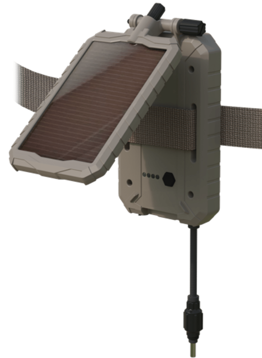 HME 5000MAH SOLAR POWER PANEL - A tan, ruggedized solar charger attached to a fabric strap. The charger has a hinged solar panel and a power cable with a connector.