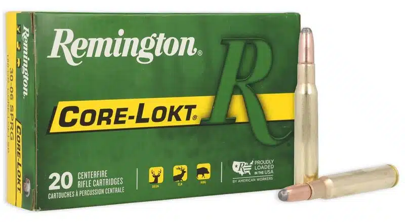 REMINGTON CORE-LOKT 30-06 SPRINGFIELD 220 GRAIN - Box of Remington Core-Lokt .30-06 rifle cartridges with two bullets displayed beside it on a white background.