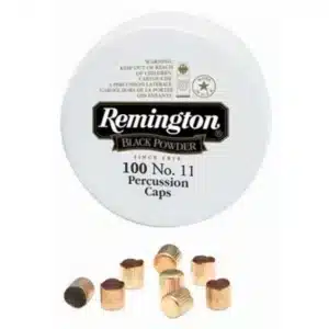 REMINGTON PERCUSSION CAP #11 - Container of Remington Black Powder No. 11 percussion caps with several small copper-colored caps displayed below.