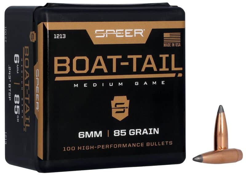 SPEER BOAT-TAIL RIFLE BULLET .243 CAL 85 GRAIN - Box of Speer Boat-Tail 6mm 85 grain medium game bullets with two copper-jacketed bullets displayed beside it.